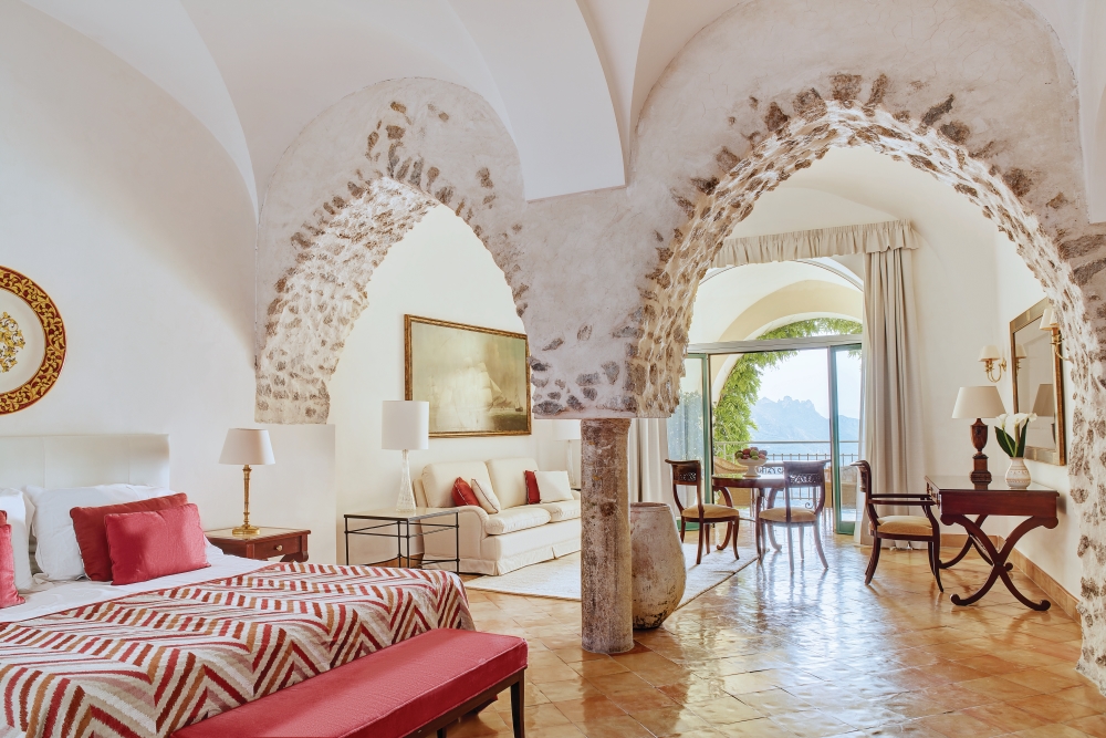 Suite at Caruso, A Belmond Hotel, Amalfi Coast, with vaulted stone arches and terrace access in Ravello, Italy