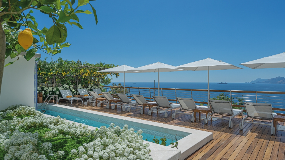 Pool area at Casa Angelina in Praiano, with panoramic views of the Mediterranean Sea on the Amalfi Coast, Italy