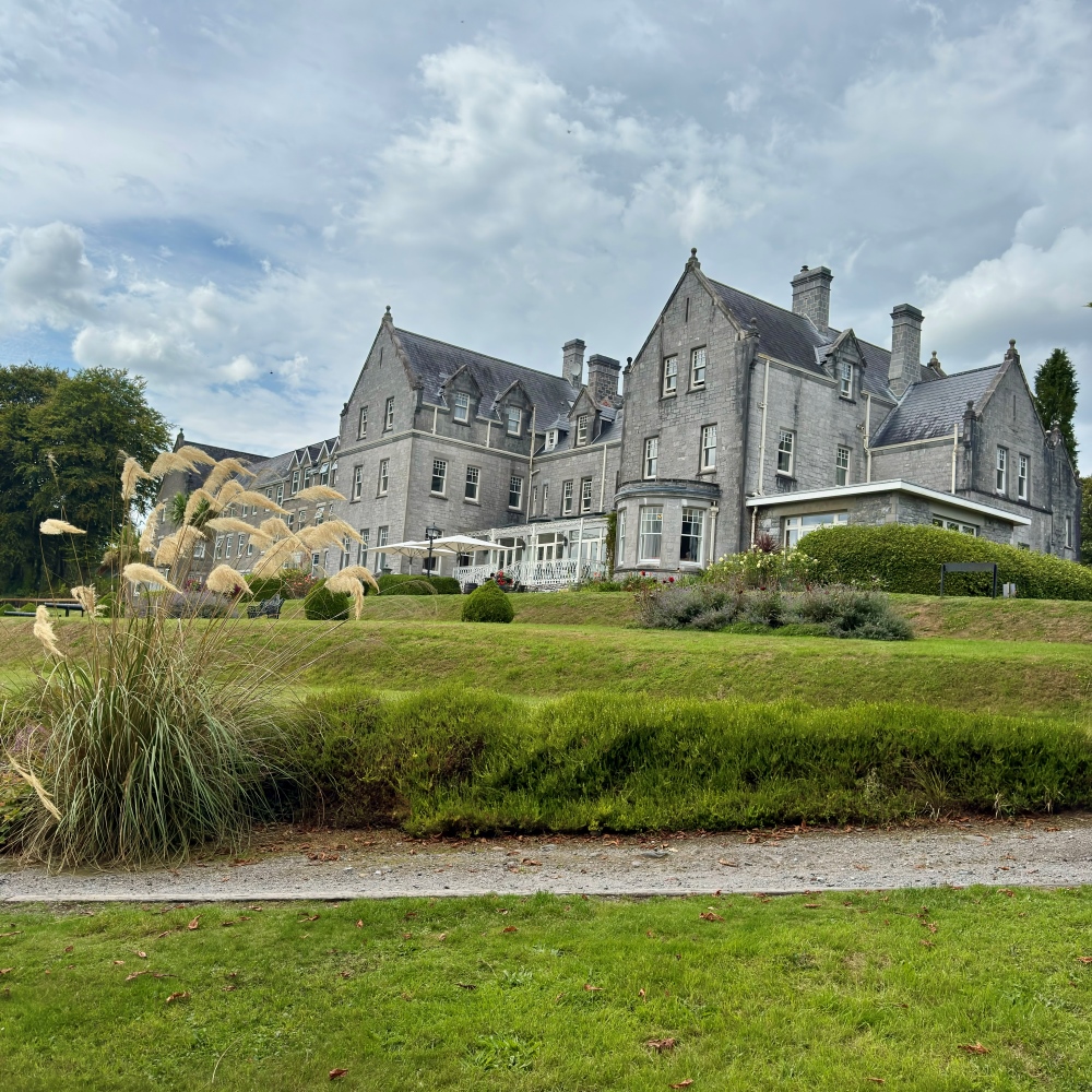 Park Hotel Kenmare surrounded by landscaped gardens and lawns in County Kerry, Ireland