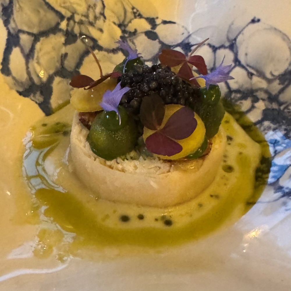Fine dining starter at Landline restaurant at Park Hotel Kenmare, featuring a beautifully presented dish with herbs and edible flowers