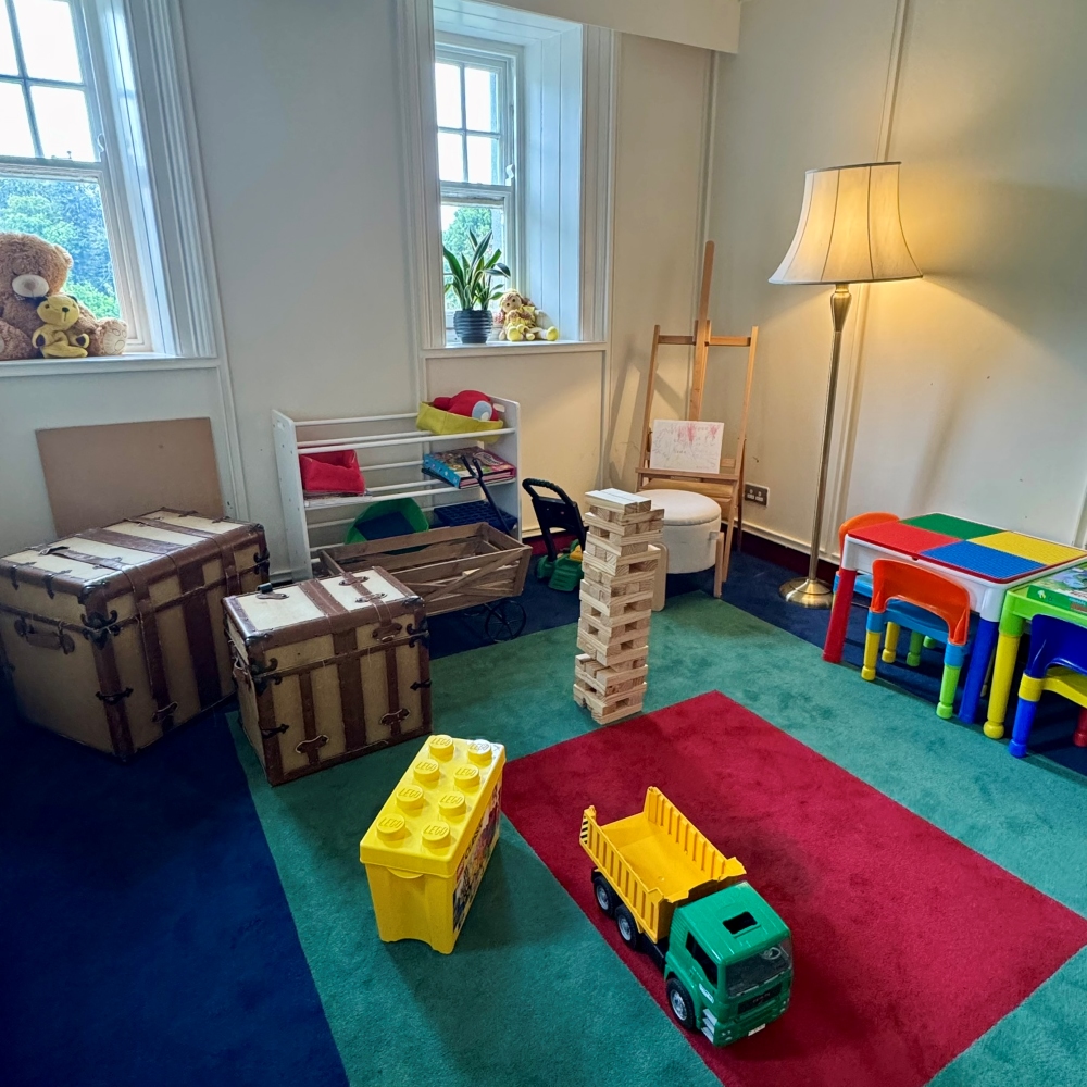 Children’s playroom at Park Hotel Kenmare with colourful toys, books and a soft play area